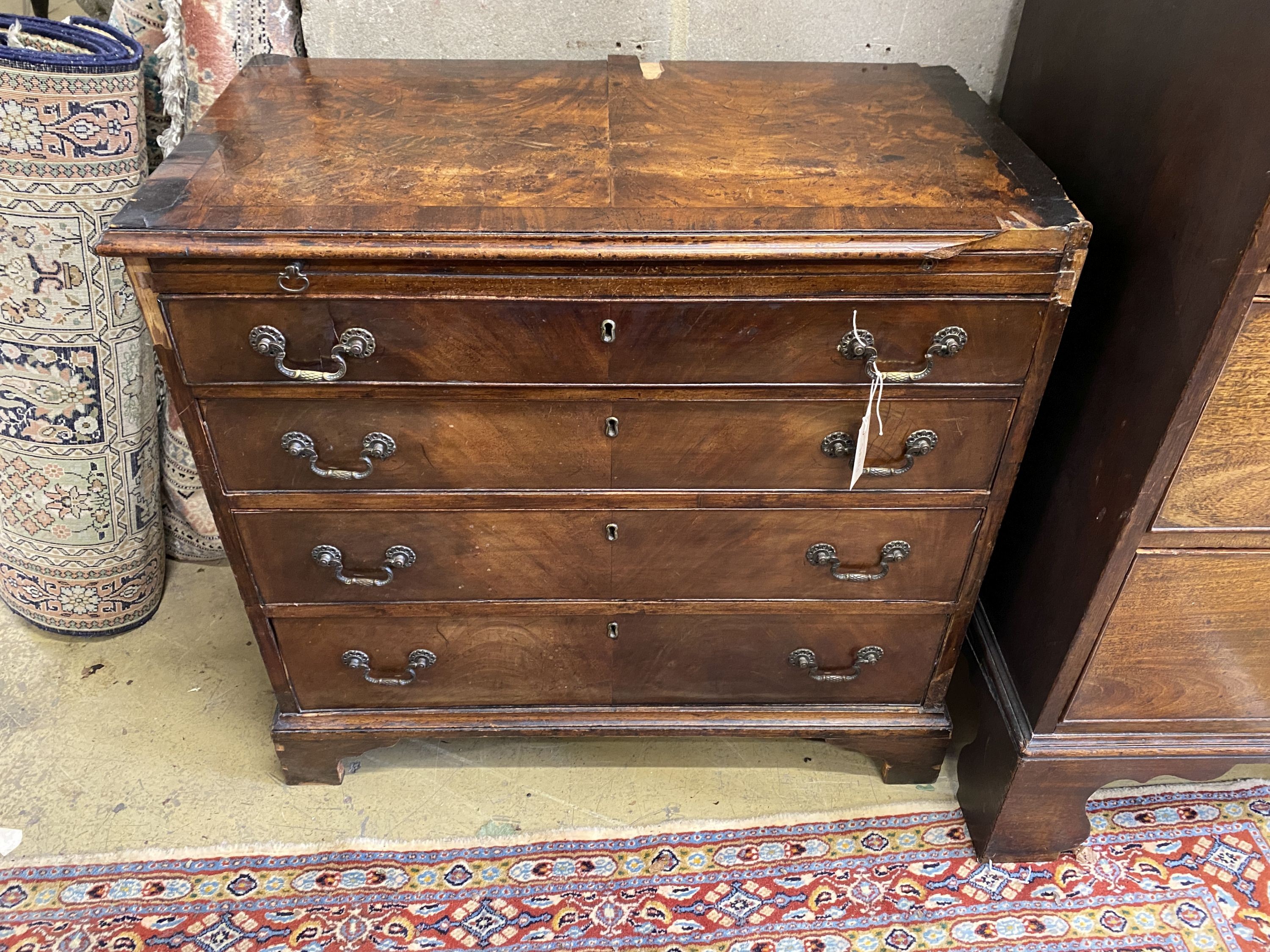 A small George III provincial mahogany four drawer chest with brushing slide, in need of restoration, width 83cm, depth 47cm, height 78cm